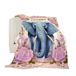 Digital print flannel blanket featuring blue elephant and roses draped on sofa