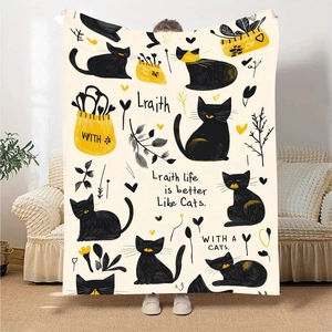 Cozy flannel blanket featuring cartoon black cats and potted plants held by hand