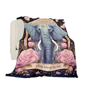 French style flannel blanket featuring a blue elephant and pink roses on a white sofa