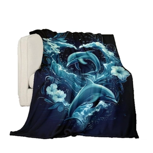 Ocean-themed flannel blanket featuring jumping dolphins and waves on a blue background