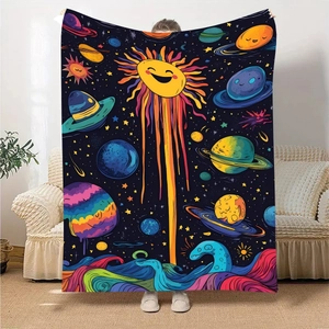 Detail of soft flannel blanket featuring cartoon universe stars and smiling sun print