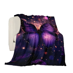 Purple mystical butterfly flannel blanket draped over white sofa armrest