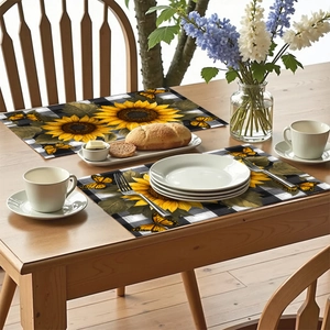 Macro view of sunflower placemat with black white checkered pattern and butterfly print