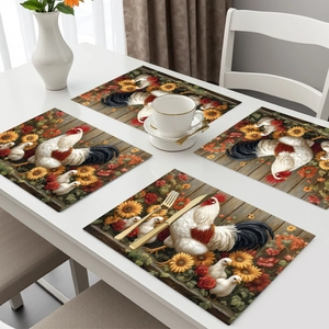 Detailed macro view of rooster and sunflower placemats on a white dining table set