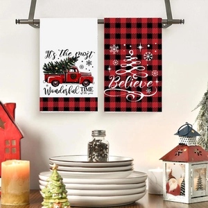 Set of two Christmas hand towels featuring red buffalo plaid and vintage truck design