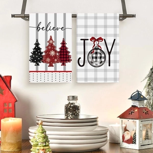 Christmas hand towel set with believe tree and joy print for festive kitchen decor