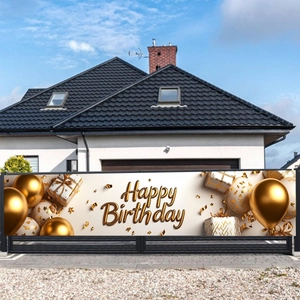 Outdoor banner detail with golden 3D Happy Birthday text, balloons, and gifts on white