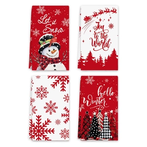 Set of 4 Christmas hand towels featuring snowman, Santa, and snowflakes in red and white