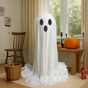 Standing white ghost Halloween decoration with glowing lights for festive home interior