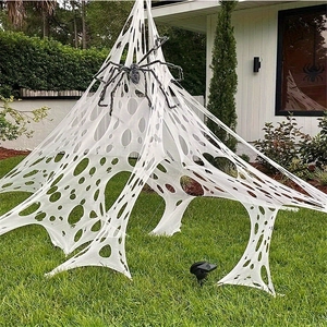 Giant Halloween yard decoration with large white spider web and fuzzy black spider set