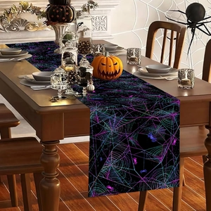 Halloween table runner featuring purple neon spider webs on black fabric for party decor