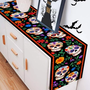 Halloween table runner featuring colorful sugar skulls and flowers on black background