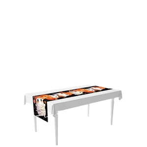 Halloween table runner featuring cute cartoon mummy and pumpkin prints on black fabric