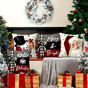 Set of 4 Christmas pillow covers with Santa and snowman print for holiday home decor