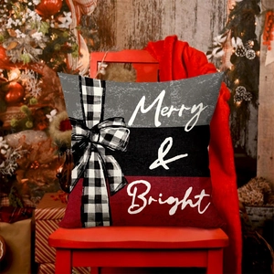 Merry and Bright Christmas pillow cover with plaid bow on a red wooden chair