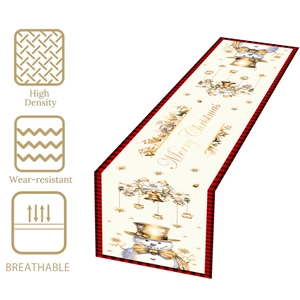 Christmas table runner with Merry Christmas print, red plaid border and snowman motif