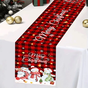 Red and black buffalo plaid Christmas table runner with cute snowmen and festive patterns