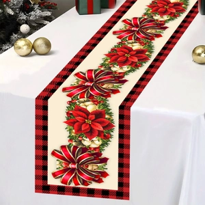 Christmas table runner with red poinsettia pattern and red plaid edges for festive decor