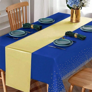 Elegant navy blue tablecloth with gold dot pattern and golden satin table runner set