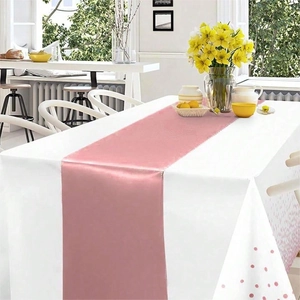 Elegant pink satin table runner for banquet settings with a smooth silk-like glossy finish