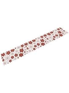 Close-up of festive Christmas table runner featuring elegant red maple leaf patterns