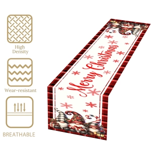 Detail of red and black buffalo check Christmas gnome table runner with high density fabric