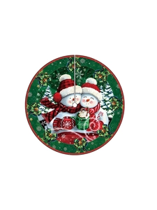 Close-up of a festive Christmas tree skirt featuring snowmen and hot cocoa patterns