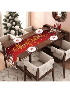 Detail of red Christmas table runner with snowman, snowflakes and Merry Christmas text