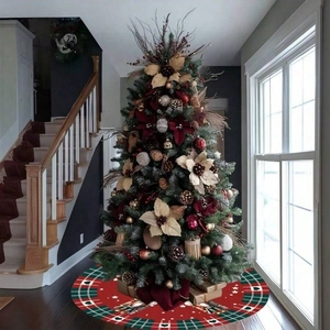 Christmas tree skirt with nutcracker soldiers and red green plaid borders for holiday decor