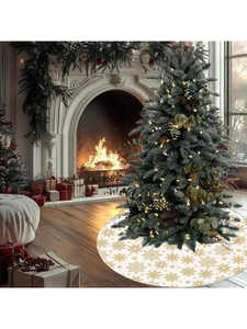 Close-up of white Christmas tree skirt featuring golden snowflake patterns and plush texture