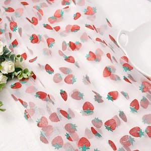 White strawberry mesh fabric with red glitter print for DIY tablecloth and party decor