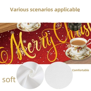 Red Christmas table runner with Merry Christmas lettering and white snowflake patterns