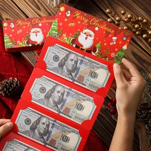 Detail of red Merry Christmas multi-layered folding card with realistic prop money slots