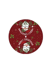 Detail of red Christmas tree skirt featuring Santa Claus, holly leaves, and white snowflakes