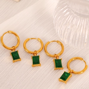 18K gold-plated earrings with emerald-cut green gemstones and polished metal finish