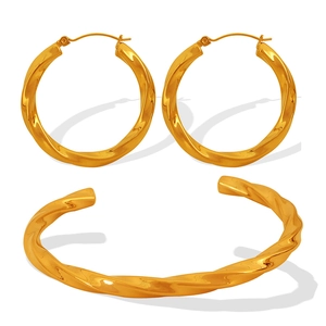Polished gold twisted rope hoop earrings and open cuff bracelet jewelry set in 304 steel
