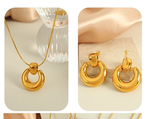 Polished 18K gold-plated necklace and hoop earring set with smooth metallic finish