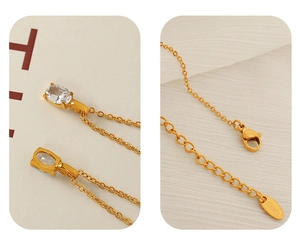 Detail of gold S925 silver necklace with oval zircon pendant and lobster clasp closure