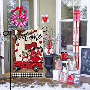 Valentine's Day garden flag featuring a gnome heart truck on a linen welcome banner