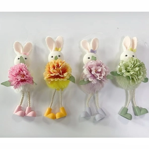 Set of four colorful Easter bunny plush ornaments with floral details and small boots
