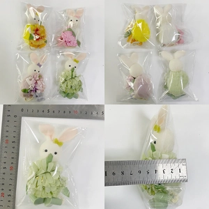 Detailed size measurements of 14cm plush Easter bunny hanging decorations in four colors
