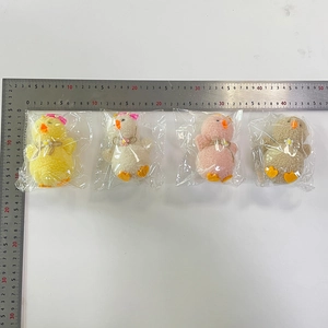 Detailed size measurement of four plush Easter chicks with lace bows and flower decors