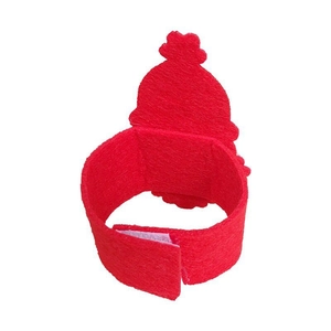 Close-up of a festive red Santa hat napkin ring made of felt with a hook and loop closure