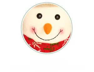 Detail of plush Christmas snowman wine bottle cover with knit scarf and smiling face