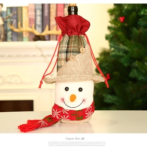 Detailed snowman wine bottle cover with knit scarf and rustic wooden buttons