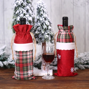 Linen Christmas wine bottle covers with red plaid patterns and snowflake decorations