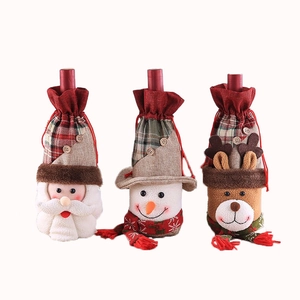 Christmas wine bottle covers set featuring Santa, Snowman, and Reindeer with plaid fabric