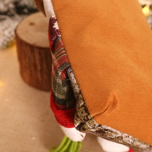 Festive Christmas candy bag with brown felt fabric and red green plaid decorative edges