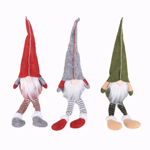 Three Nordic Christmas Gnomes with long striped legs for festive window decoration
