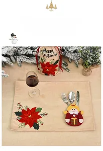 Christmas place mat and cutlery holder set with Santa motif and Merry Christmas text
